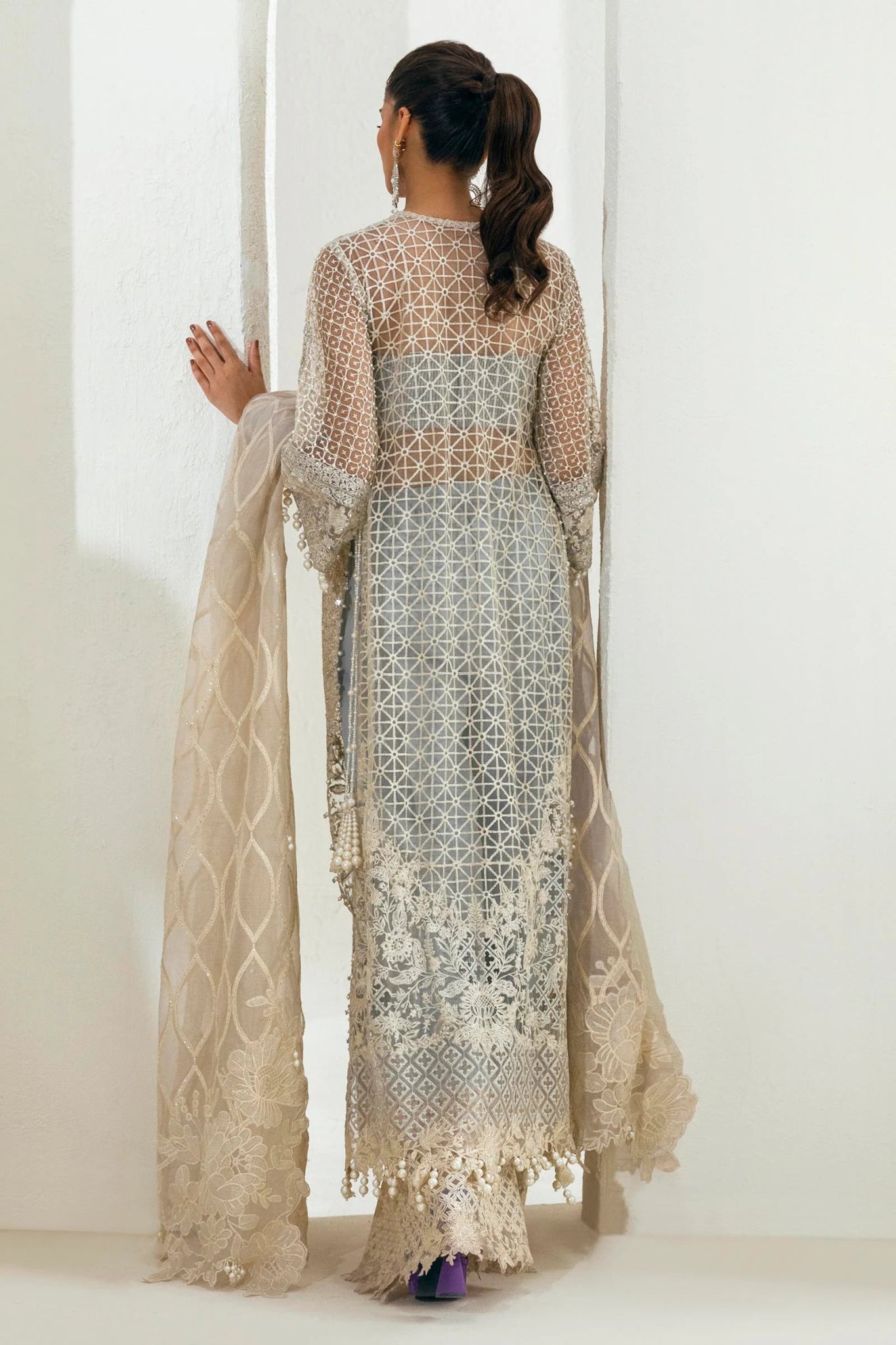 Model wearing Sana Safinaz NURA Festive'24 Vol. II N242 - 001 - 3CT dress in silver and beige. Perfect for Pakistani wedding clothes, available online in the UK.