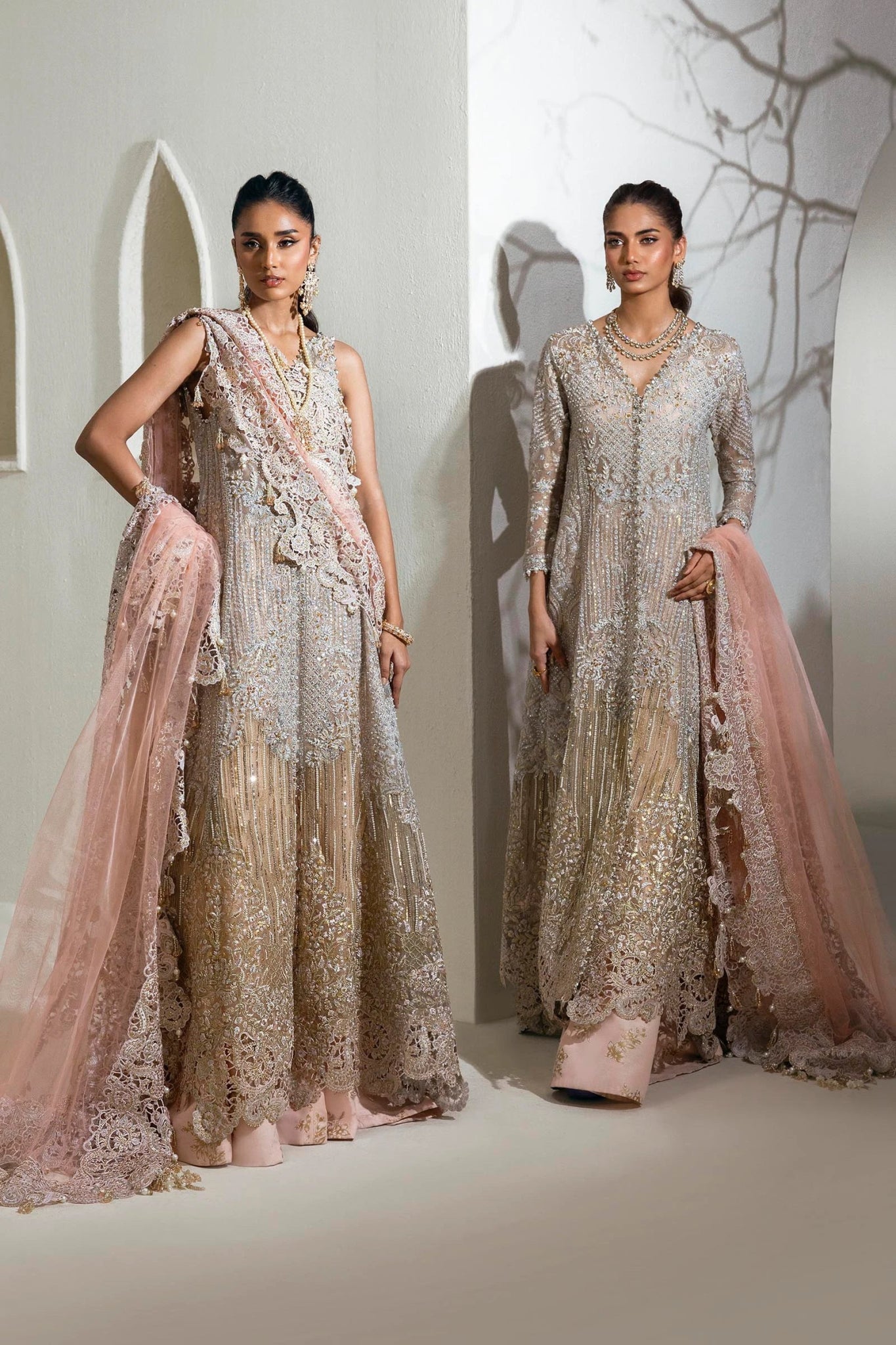 Model wearing Sana Safinaz NURA Festive'24 Vol. II N242 - 003 - 3CT dress in a stunning beige and pink color combination. Perfect for weddings, available online in the UK.