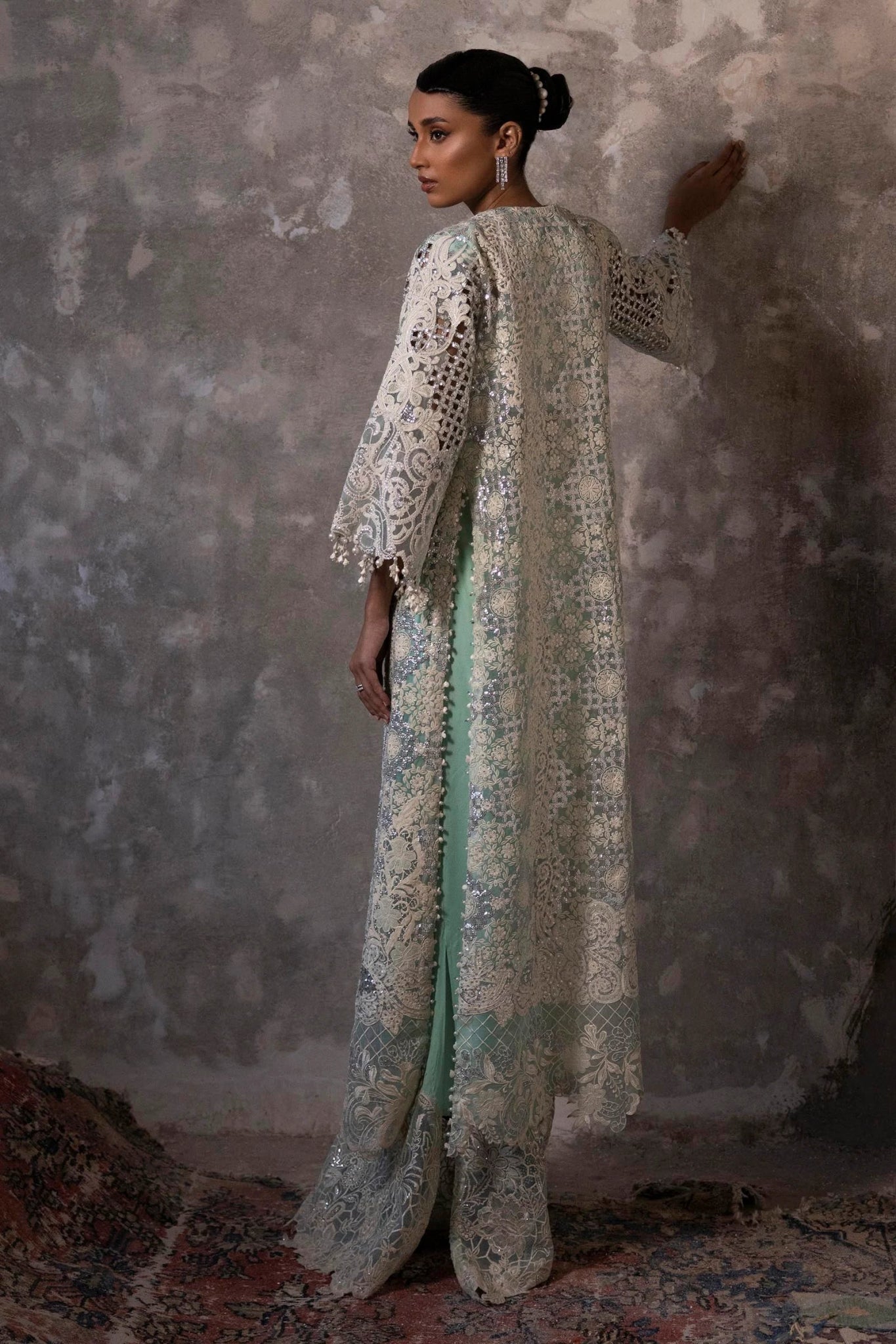 This stunning Sana Safinaz Nura Vol. 3 2024 ensemble features a hand - embellished lavender organza shirt with intricate cutwork, paired with a digitally printed woven net lehenga and an embroidered dupatta. Available exclusively at Signature Labels for £391. Ideal for formal events.