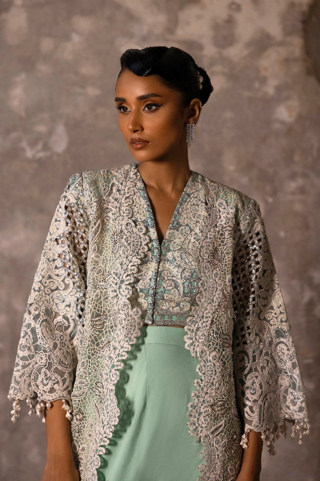 This stunning Sana Safinaz Nura Vol. 3 2024 ensemble features a hand - embellished lavender organza shirt with intricate cutwork, paired with a digitally printed woven net lehenga and an embroidered dupatta. Available exclusively at Signature Labels for £391. Ideal for formal events.