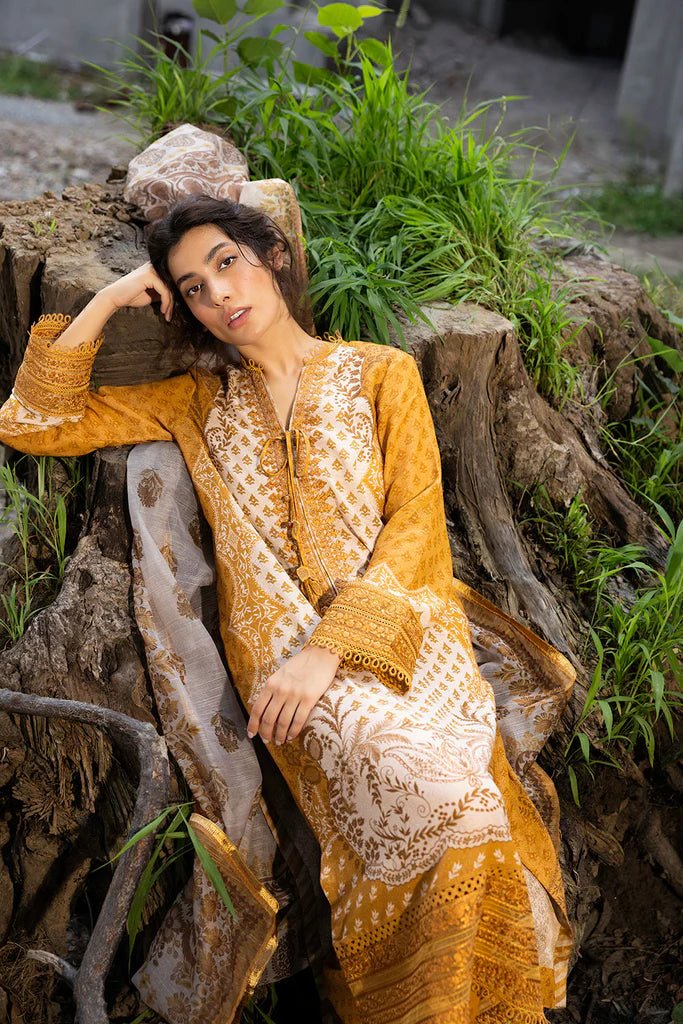 Model wearing mustard - colored Design 7B from Sobia Nazir's Fall Edit '24 collection. Pakistani winter clothes, casual pret available online in the UK.