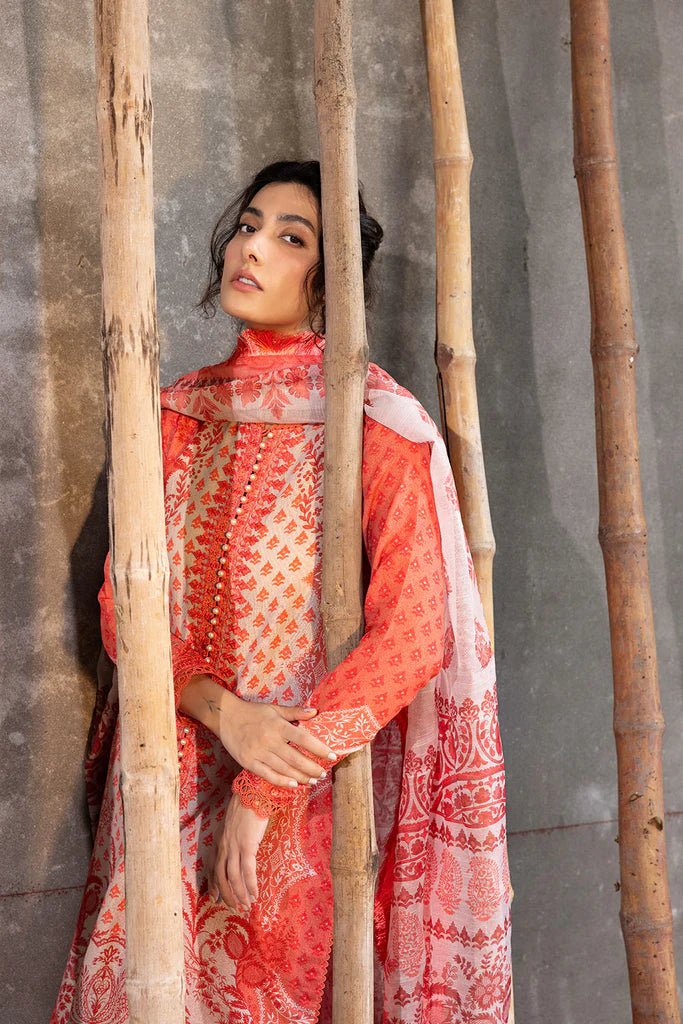 Model wearing coral and cream - colored Design 1B from Sobia Nazir's Fall Edit '24 collection. Pakistani winter clothes, casual pret available online in the UK.