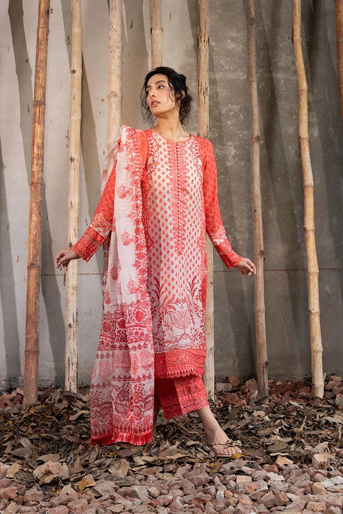 Model wearing coral and cream - colored Design 1B from Sobia Nazir's Fall Edit '24 collection. Pakistani winter clothes, casual pret available online in the UK.