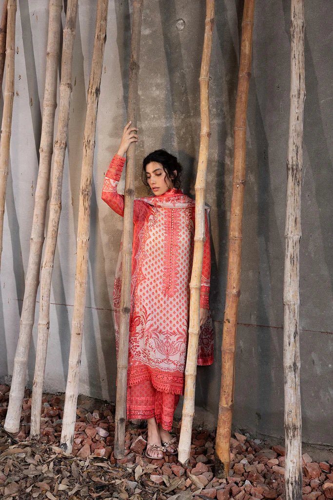 Model wearing coral and cream - colored Design 1B from Sobia Nazir's Fall Edit '24 collection. Pakistani winter clothes, casual pret available online in the UK.