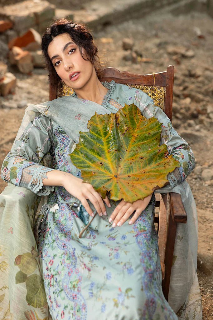 Model wearing pastel green floral embroidered Design 2A from Sobia Nazir's Fall Edit '24 collection. Pakistani winter clothes, casual pret available online in the UK.