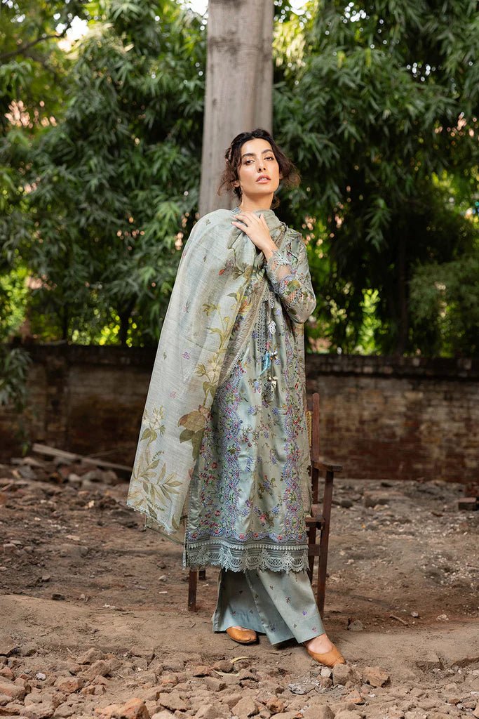 Model wearing pastel green floral embroidered Design 2A from Sobia Nazir's Fall Edit '24 collection. Pakistani winter clothes, casual pret available online in the UK.