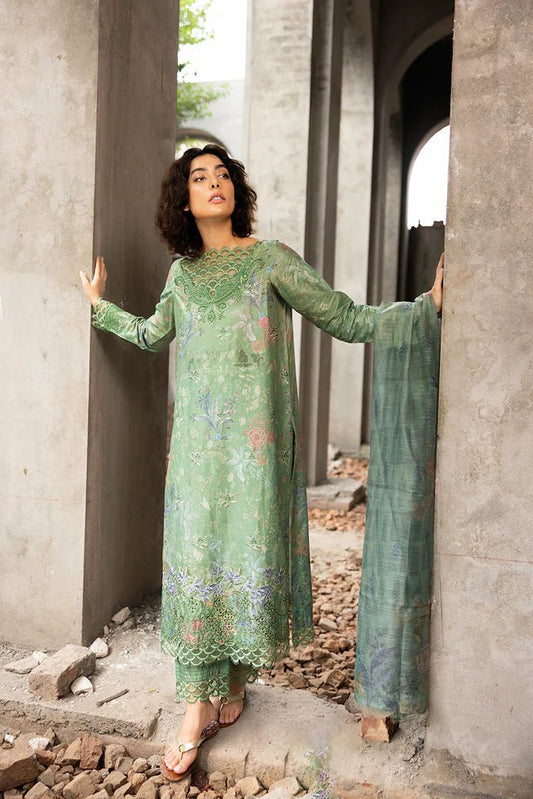 Model wearing green floral embroidered Design 3A from Sobia Nazir's Fall Edit '24 collection. Pakistani winter clothes, casual pret available online in the UK.