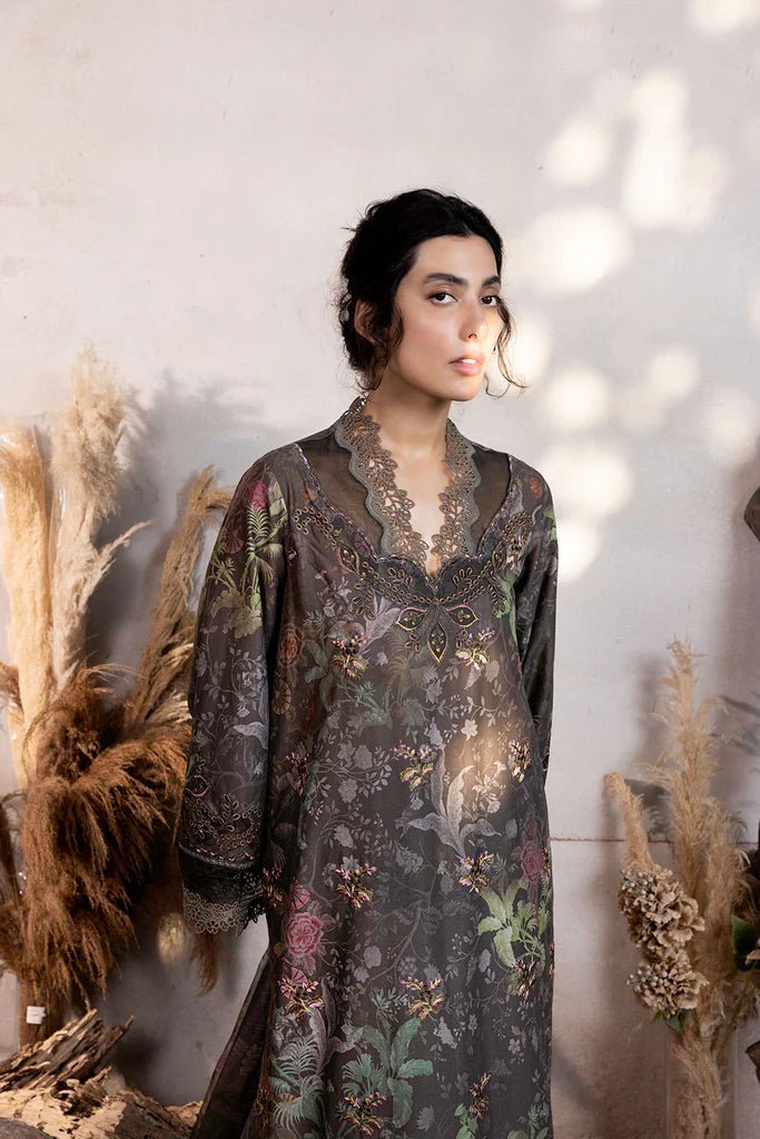 Model wearing dark floral embroidered Design 3B from Sobia Nazir's Fall Edit '24 collection. Pakistani winter clothes, casual pret available online in the UK.