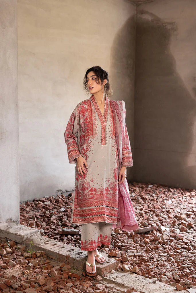 Model wearing beige and red embroidered Design 5A from Sobia Nazir's Fall Edit '24 collection. Pakistani winter clothes, casual pret available online in the UK.