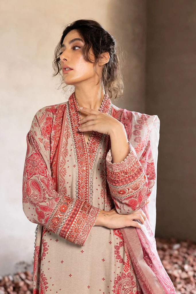 Model wearing beige and red embroidered Design 5A from Sobia Nazir's Fall Edit '24 collection. Pakistani winter clothes, casual pret available online in the UK.