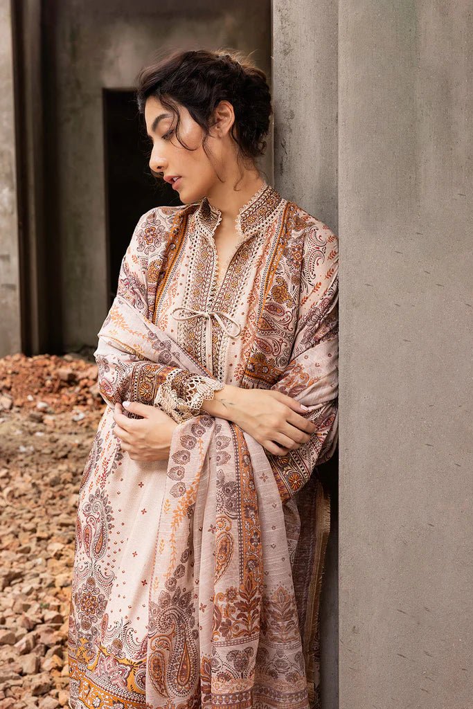 Model wearing beige and brown embroidered Design 5B from Sobia Nazir's Fall Edit '24 collection. Pakistani winter clothes, casual pret available online in the UK.