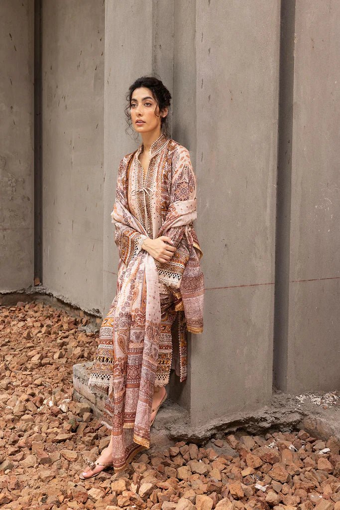 Model wearing beige and brown embroidered Design 5B from Sobia Nazir's Fall Edit '24 collection. Pakistani winter clothes, casual pret available online in the UK.