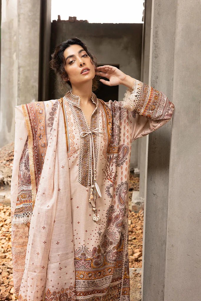 Model wearing beige and brown embroidered Design 5B from Sobia Nazir's Fall Edit '24 collection. Pakistani winter clothes, casual pret available online in the UK.