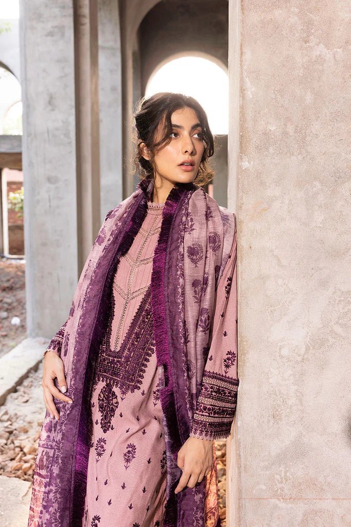 Model wearing Sobia Nazir Fall Edit '24 Design 7B, featuring a purple outfit with intricate embroidery, perfect for winter casual pret. Available online in the UK.