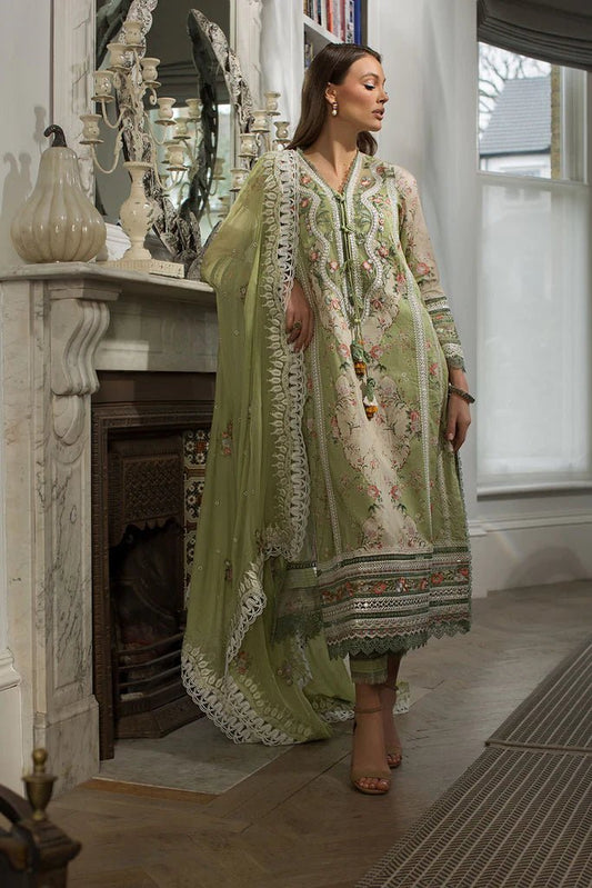 Model in Sobia Nazir DESIGN 14A, a graceful green Pakistani lawn suit, popular in the UK.