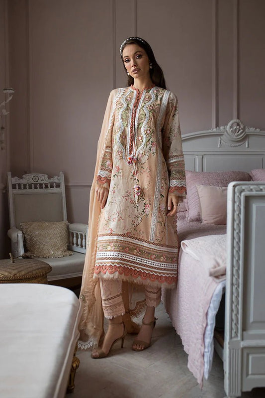 Model contemplates in a Sobia Nazir DESIGN 14B, showcasing Pakistani craftsmanship in the UK.