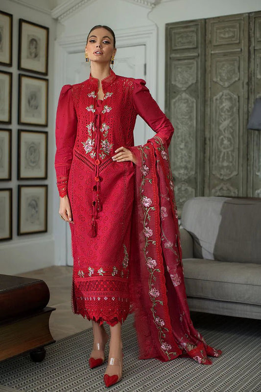 Model in Sobia Nazir DESIGN 3B, chic red Pakistani dress, perfect for UK's trendsetters.