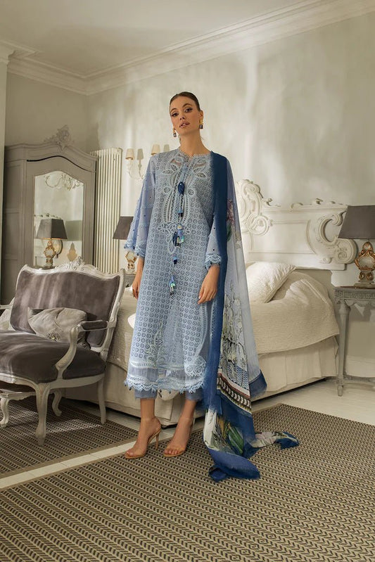 Model poses in Sobia Nazir DESIGN 5A, a graceful grey Pakistani lawn outfit, perfect for UK's chic fashion.