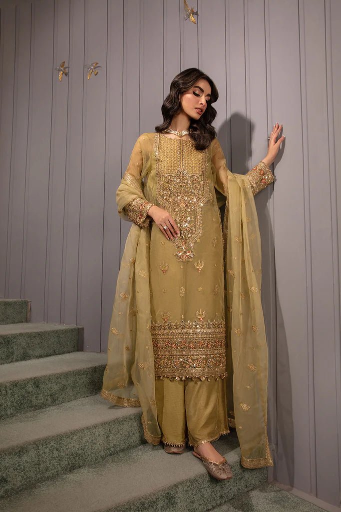 Model wearing Sobia Nazir Design 01 dress, golden yellow luxury pret, Pakistani designer wedding attire in UK.