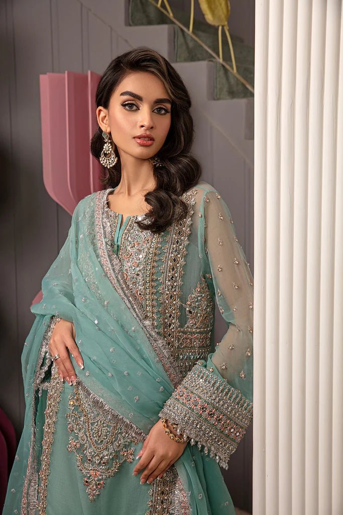 Model wearing Sobia Nazir's Design 02 from Luxury Pret '24, showcasing Pakistani fashion online in the UK.