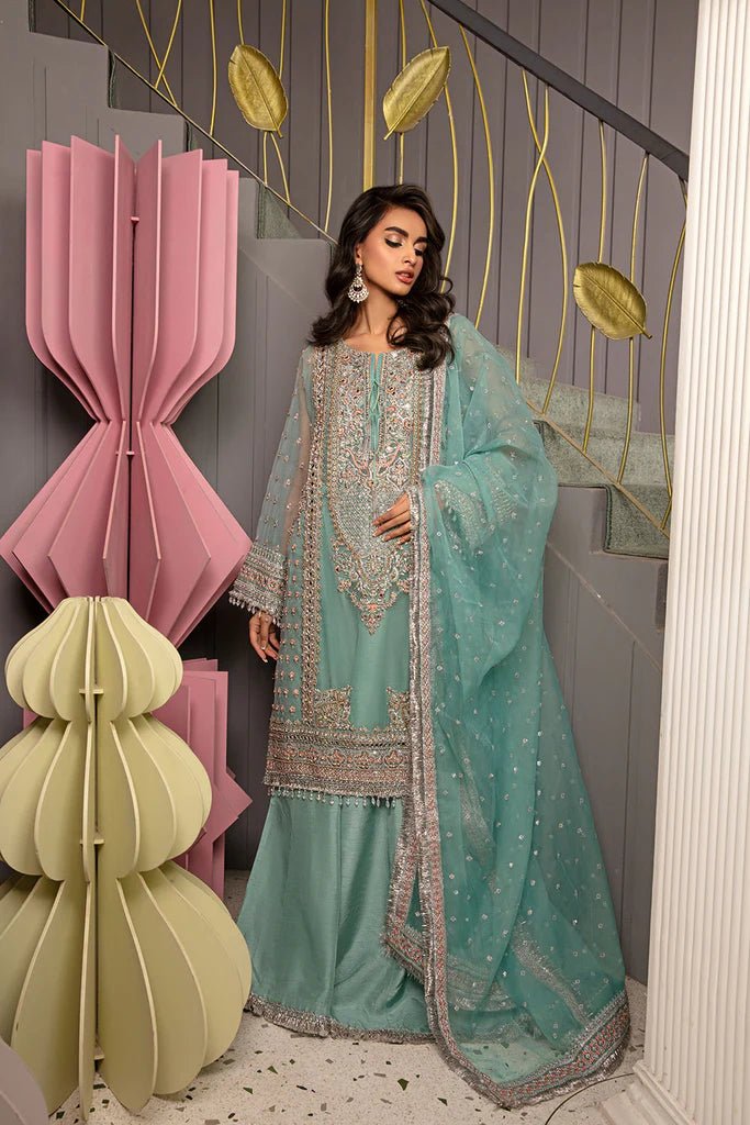 Model wearing Sobia Nazir Design 02 dress, serene aqua luxury pret, Pakistani designer wedding attire in UK.