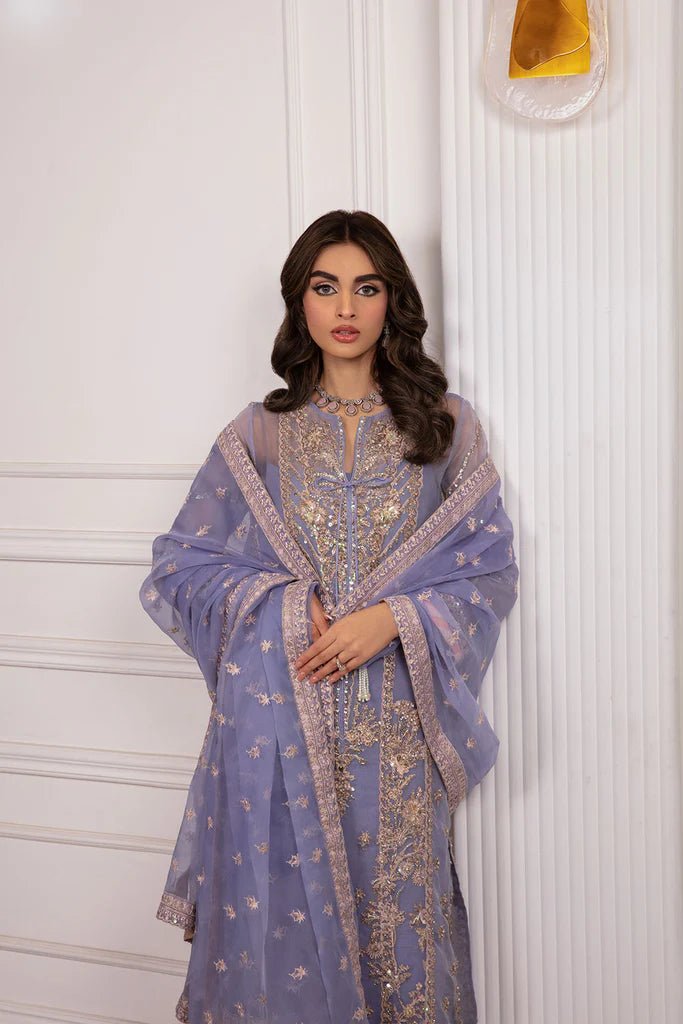 Model wearing Sobia Nazir's Design 03 from Luxury Pret '24, showcasing Pakistani fashion online in the UK.