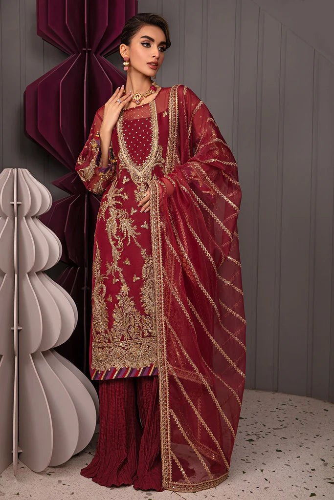 Model wearing Sobia Nazir Design 04 dress, rich burgundy luxury pret, Pakistani designer wedding attire in UK.