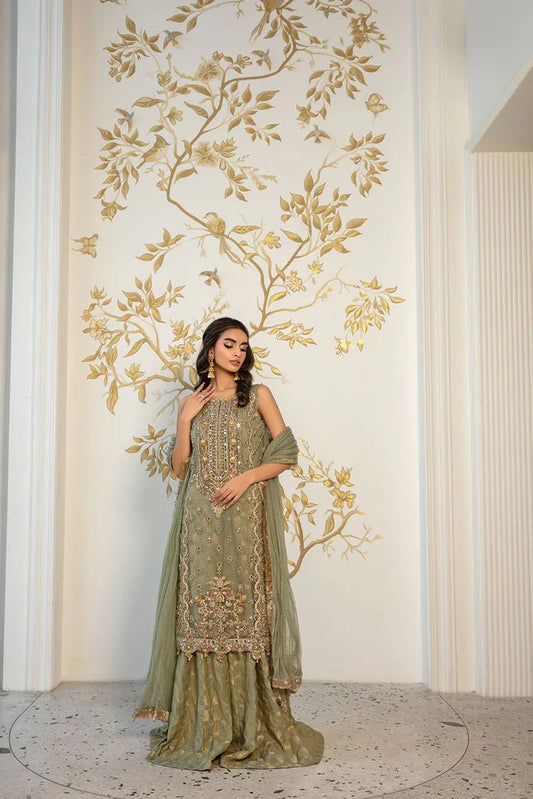 Model wearing Sobia Nazir Design 06 dress, olive green luxury pret, Pakistani designer wedding attire in UK.