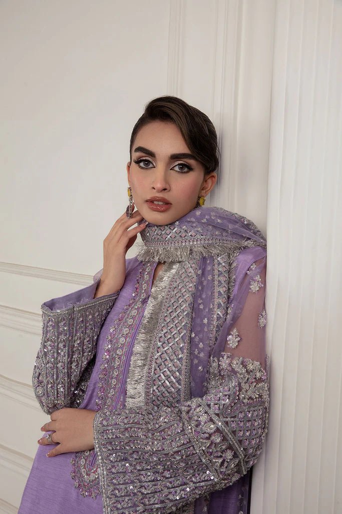 Model wearing Sobia Nazir's Design 09 from Luxury Pret '24, showcasing Pakistani fashion online in the UK.