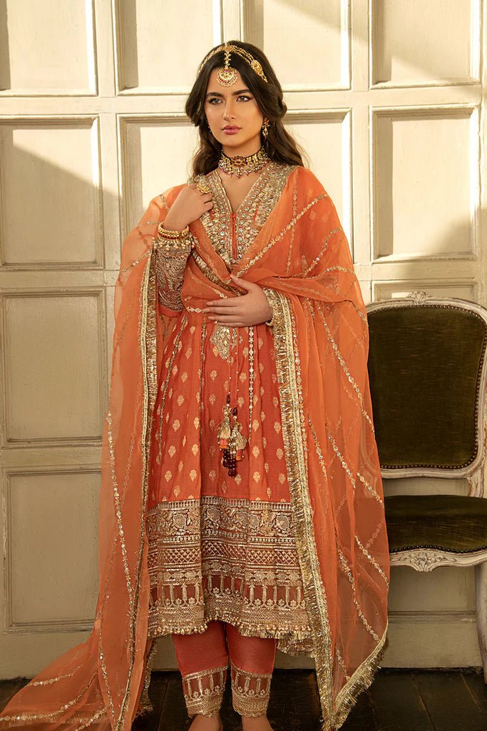 Model wearing Sobia Nazir's Design 01 from Nur Festive Collection '23, showcasing Pakistani clothes online in the UK.