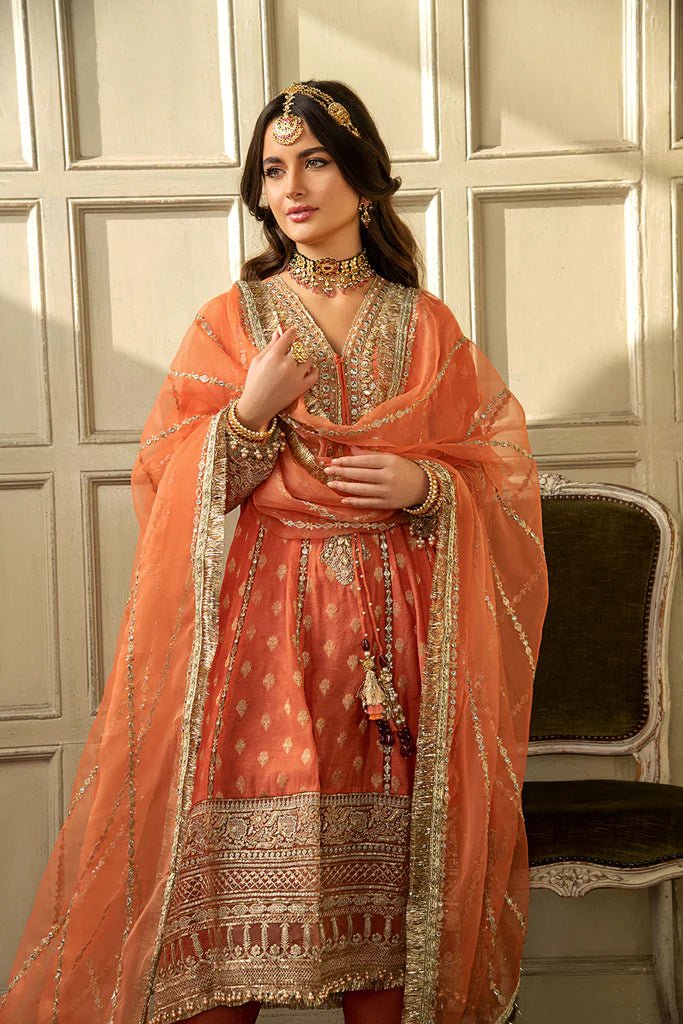 Model wearing Sobia Nazir's Design 01 from Nur Festive Collection '23, showcasing Pakistani clothes online in the UK.