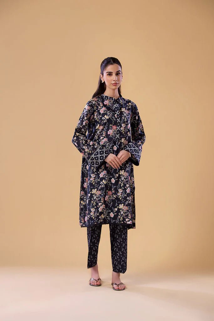 Model wearing a navy floral print dress with matching trousers from Sobia Nazir's Pret '24 collection, SNPP - 24 - 0308. Perfect for showcasing Pakistani clothes online in the UK, ideal for casual and semi - formal occasions.