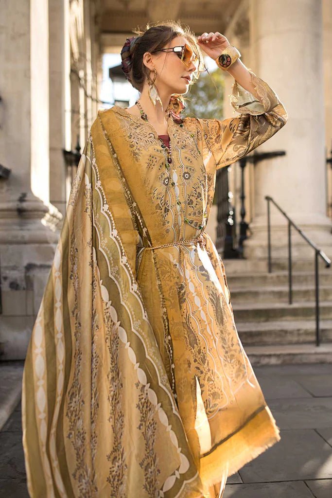 Model wearing Sobia Nazir Satin '24 Design 01, a golden and beige printed outfit with intricate patterns, perfect for winter. Available as Pakistani clothes online in the UK.