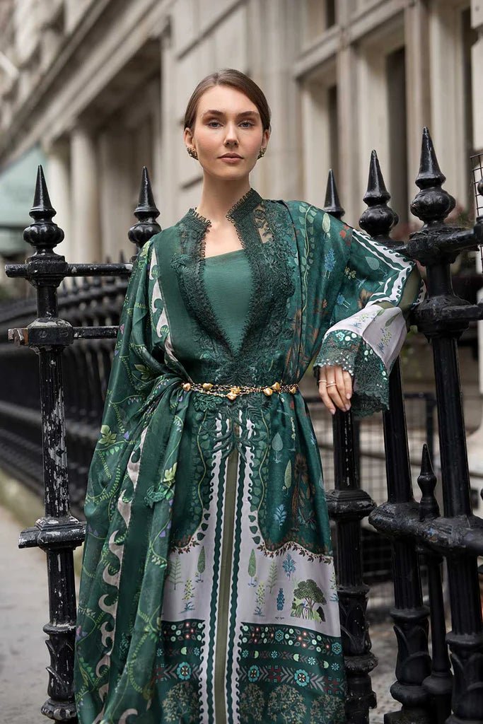 Model wearing Sobia Nazir Satin '24 Design 02, a deep green printed outfit with intricate detailing, ideal for winter. Available as Pakistani clothes online in the UK.