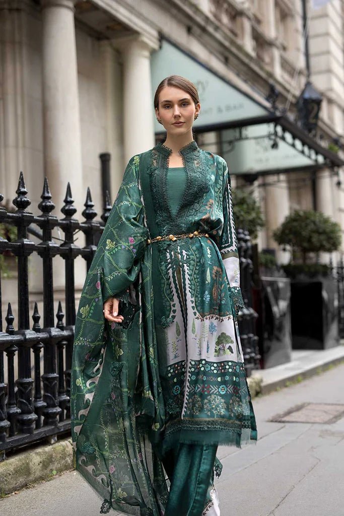 Model wearing Sobia Nazir Satin '24 Design 02, a deep green printed outfit with intricate detailing, ideal for winter. Available as Pakistani clothes online in the UK.