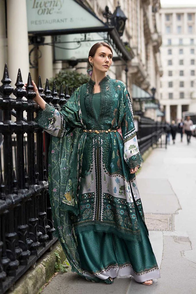 Model wearing Sobia Nazir Satin '24 Design 02, a deep green printed outfit with intricate detailing, ideal for winter. Available as Pakistani clothes online in the UK.