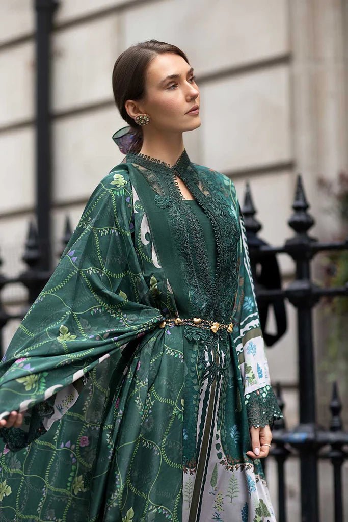 Model wearing Sobia Nazir Satin '24 Design 02, a deep green printed outfit with intricate detailing, ideal for winter. Available as Pakistani clothes online in the UK.