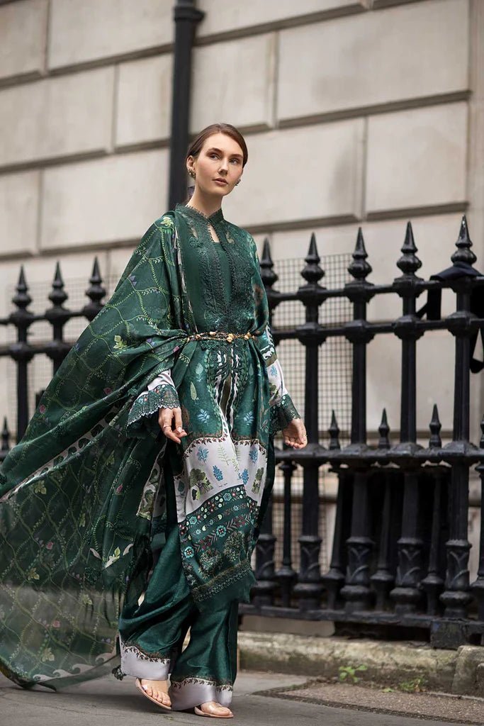 Model wearing Sobia Nazir Satin '24 Design 02, a deep green printed outfit with intricate detailing, ideal for winter. Available as Pakistani clothes online in the UK.