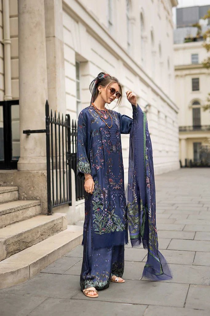 Model wearing Sobia Nazir Satin '24 Design 04, a navy blue floral printed outfit with elegant detailing, perfect for winter. Available as Pakistani clothes online in the UK.