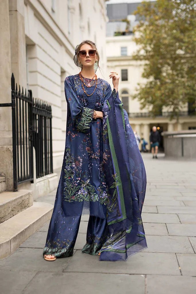 Model wearing Sobia Nazir Satin '24 Design 04, a navy blue floral printed outfit with elegant detailing, perfect for winter. Available as Pakistani clothes online in the UK.