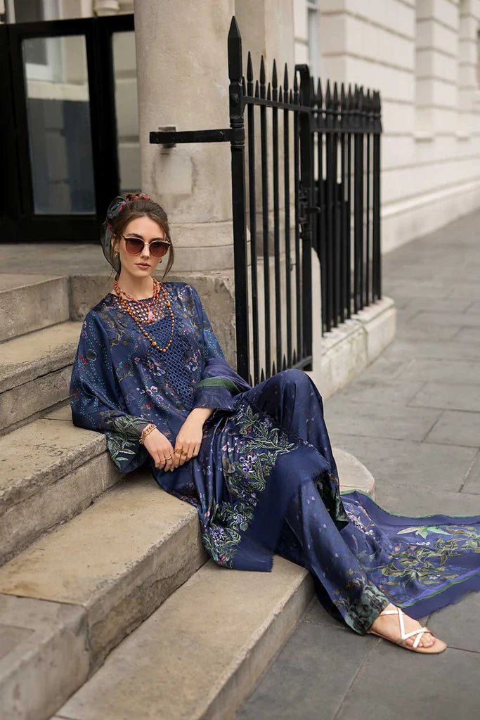 Model wearing Sobia Nazir Satin '24 Design 04, a navy blue floral printed outfit with elegant detailing, perfect for winter. Available as Pakistani clothes online in the UK.