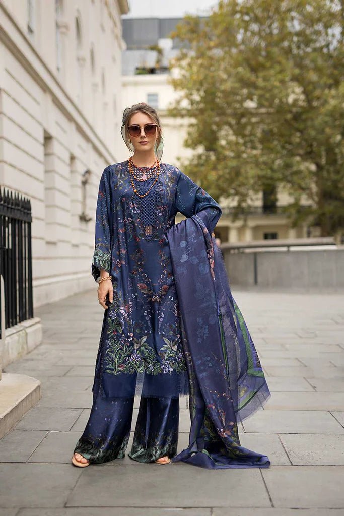 Model wearing Sobia Nazir Satin '24 Design 04, a navy blue floral printed outfit with elegant detailing, perfect for winter. Available as Pakistani clothes online in the UK.