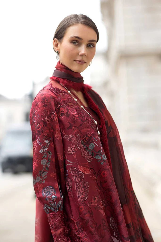 Model wearing Sobia Nazir Satin '24 Design 05, a rich maroon printed outfit with intricate detailing, perfect for winter. Available as Pakistani clothes online in the UK.