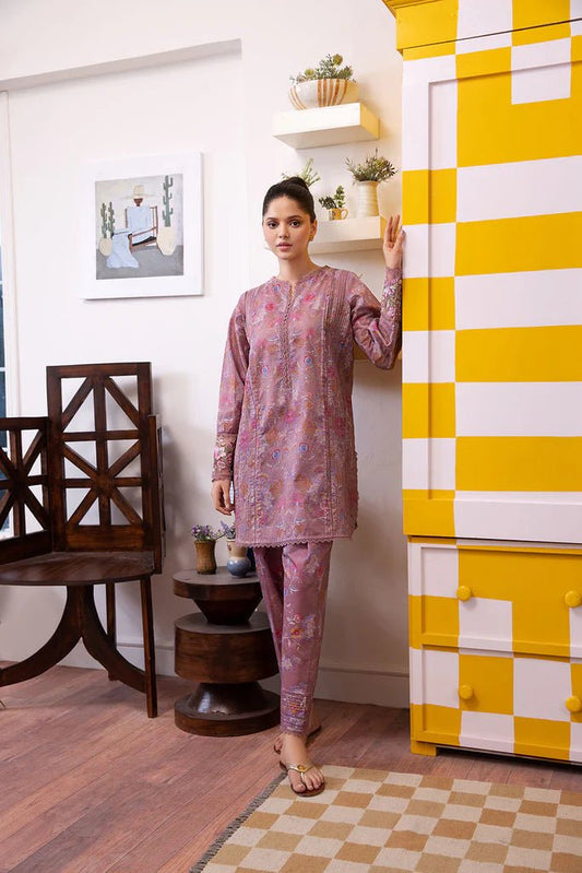 Model wearing Design 6A dress from Sobia Nazir's SN Basics '24 Unstitched collection. Shop Sobia Nazir for Pakistani clothes online in UK.