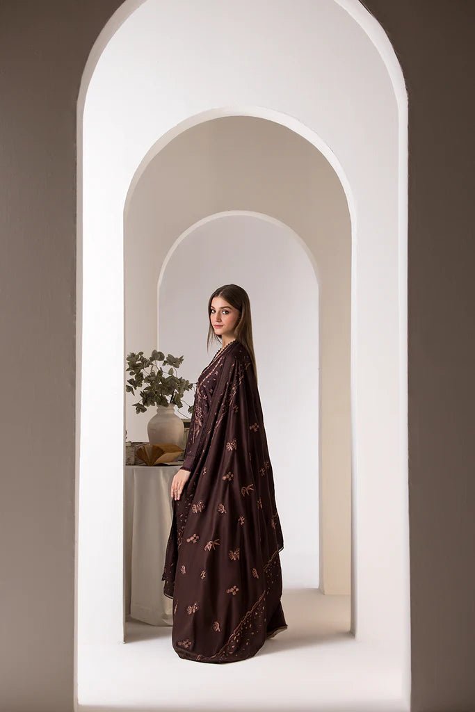 Model wearing Design 2B from Sobia Nazir's Winter Shawl '24 in rich, warm tones. Pakistani clothes online in UK at Signature Labels