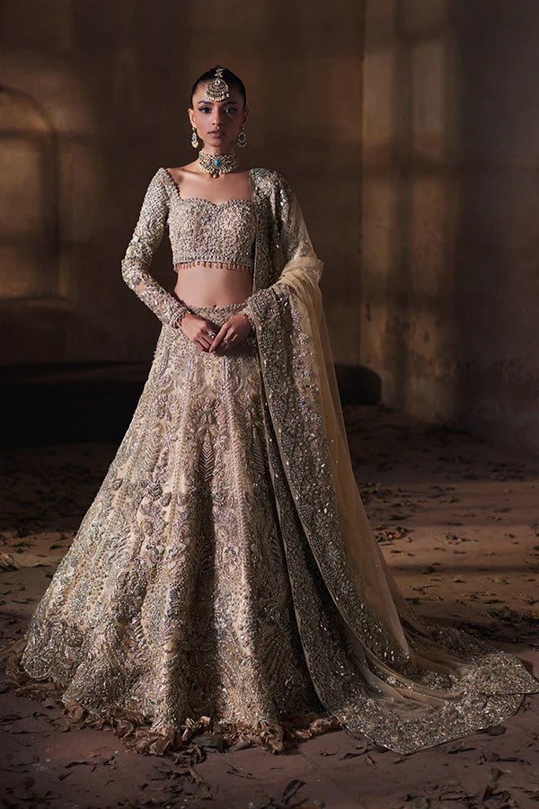 model wearing SORAYA RAYA Pakistani bridal dress in UK, gold sequined lehenga with dupatta