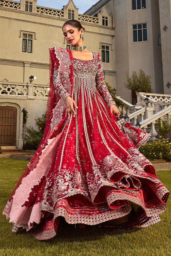 Model wearing vibrant red MARYBELLÉ dress from Soraya, embellished with white and gold embroidery, perfect for Pakistani wedding and nikkah look in UK