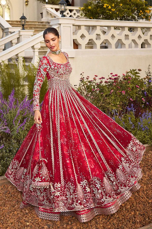 Model wearing vibrant red MARYBELLÉ dress from Soraya, embellished with white and gold embroidery, perfect for Pakistani wedding and nikkah look in UK