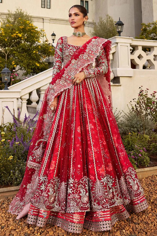 Model wearing vibrant red MARYBELLÉ dress from Soraya, embellished with white and gold embroidery, perfect for Pakistani wedding and nikkah look in UK