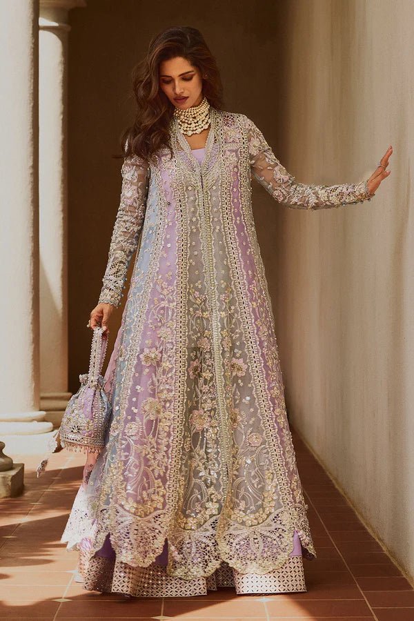 Model wearing pastel lilac ORCHID dress from Soraya, adorned with intricate embroidery and embellishments, perfect for Pakistani wedding clothes in the UK.